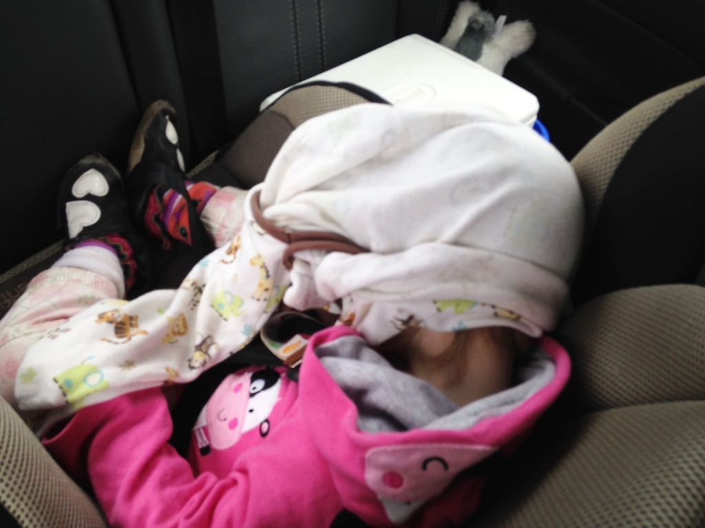 Our daughter sleeping in her carseat on our Maui family vacation.