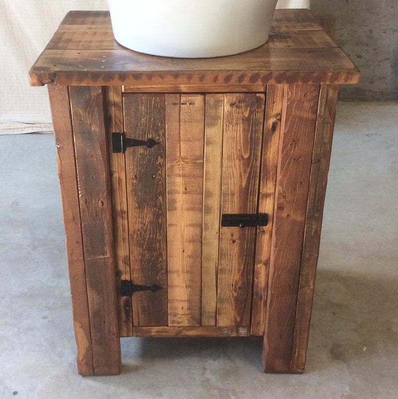 Looking to create an eco-friendly bathroom? It's the perfect opportunity to green everything - including your tub, sink, faucet, vanity and toilet! A vanity made from reclaimed wood is one way to put the 