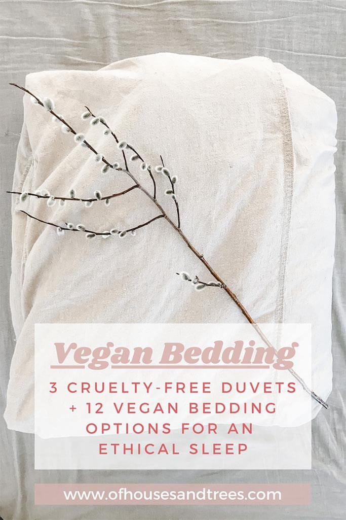 A beige duvet cover with a pussy willow branch on top and text vegan bedding.