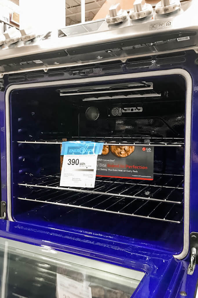 Open oven with EnerGuide label on display.