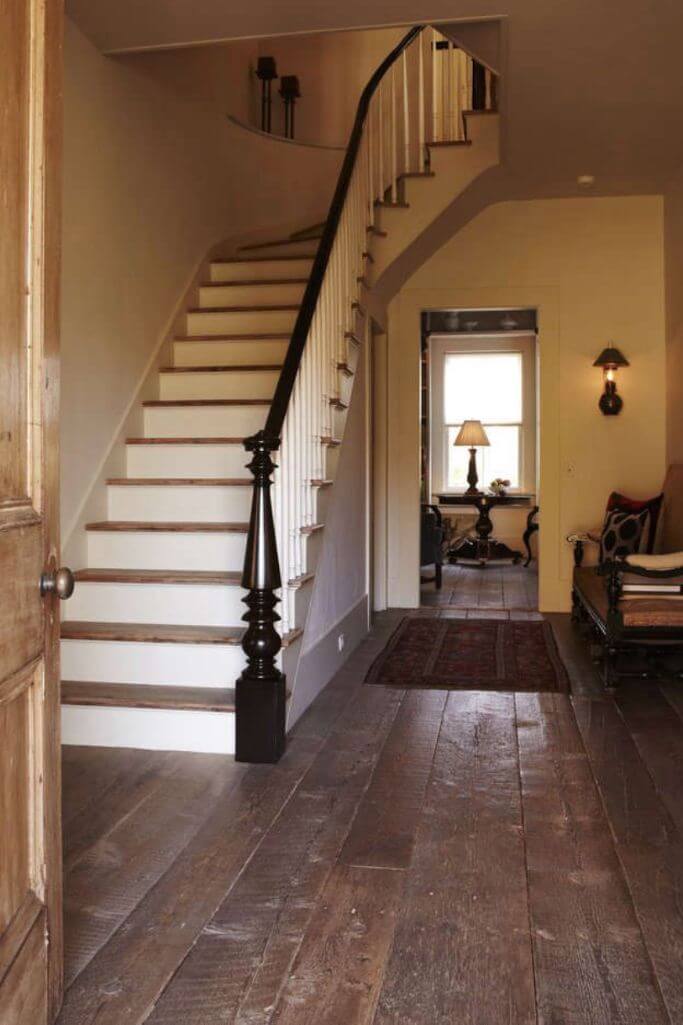 Salvaged wood floors in the entrance of a character home.