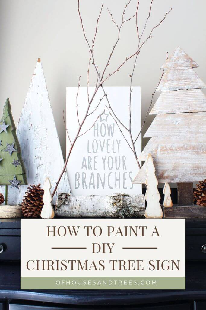 Rustic Christmas decor including a sign with text how lovely are your branches.