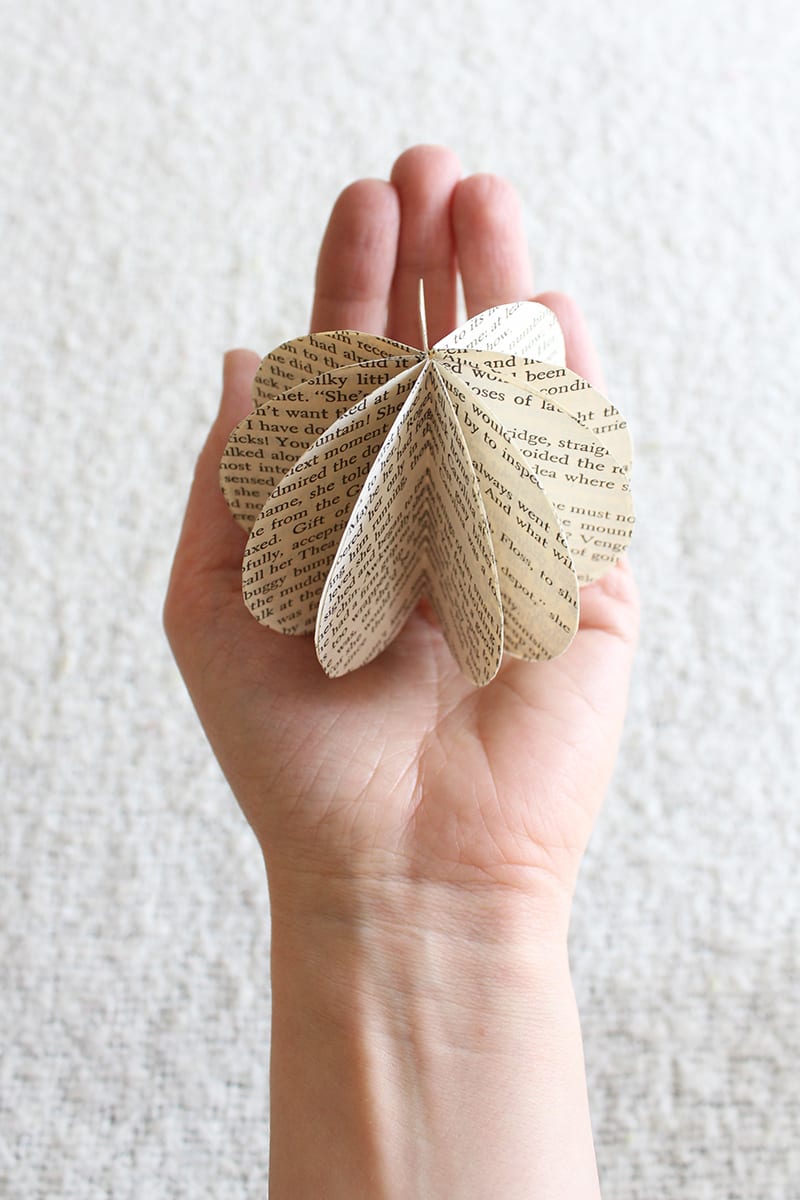 If you're looking for eco-friendly DIY projects, try this simple paper orb made from old book pages. Sure, cutting up an old book feels slightly blasphemous. But the end result is both lovely and green!