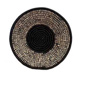 Whether your decor style is Boho, Coastal - even Minimalist - there's a set of woven basket wall decor out there with your name on it! And you can start with the Black Spotted Wall Bowl from ethical brand KAZI.