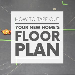 A concrete floor with green painter's tape and an orange measuring tape with the words "how to tape out your new home's floor plan." Click to visit post.