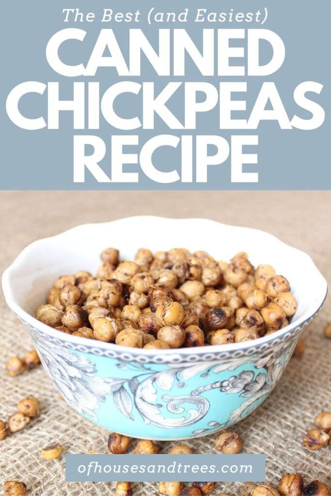 A blue bowl with a floral pattern filled with baked chickpeas with text canned chickpeas recipe.