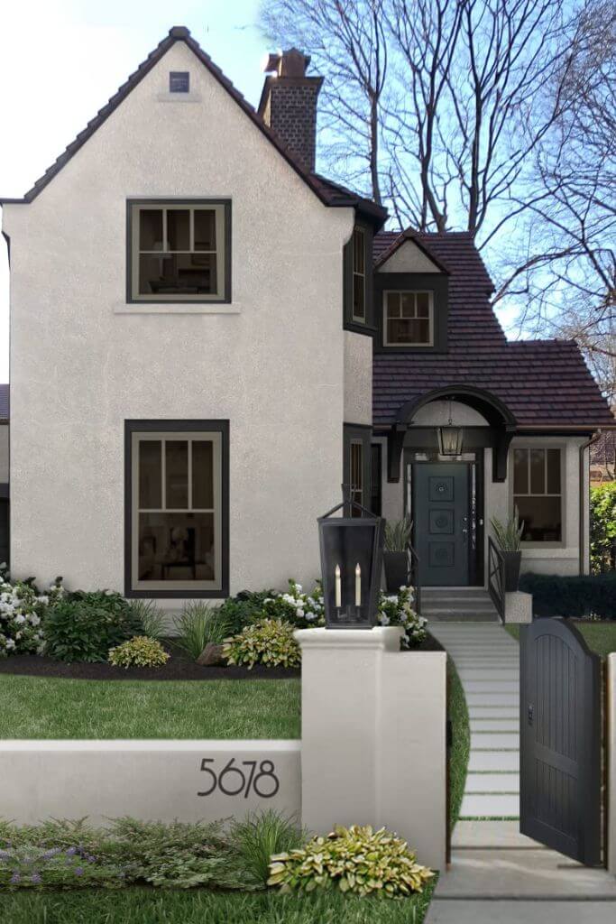 A home exterior with white stucco and black roofing and accents.