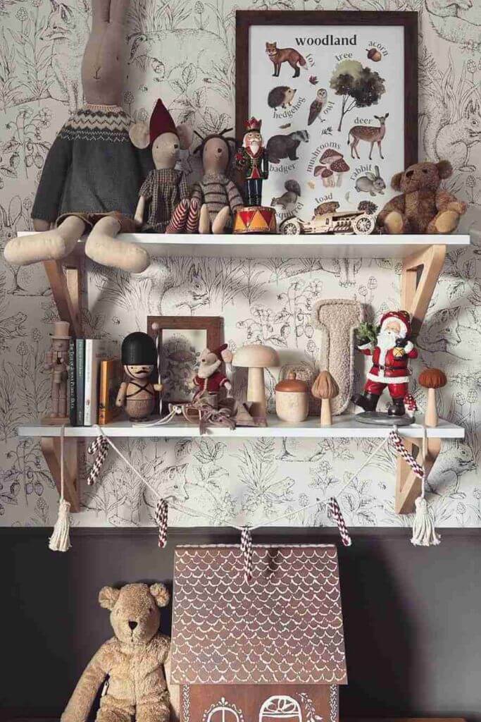 Two wooden shelves lined with toys such as a rabbit, wooden mushrooms and other nature-inspired items.