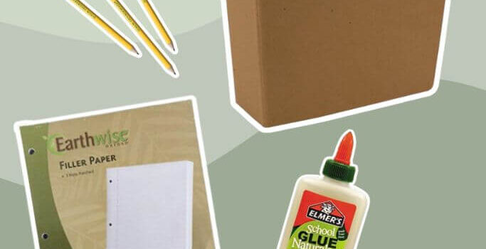 Various school supplies on a green background, including a brown binder, yellow pencils and scissors with a green handle.