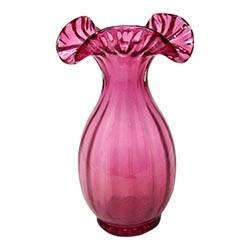 Think eco-friendly decor only works in bohemian or rustic-styled rooms? Think again! This vintage vase from Chairish is perfect for an eco-maximalist living space.