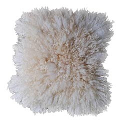 Think eco-friendly decor only works in bohemian or rustic-styled rooms? Think again! This handmade faux sheepskin from Etsy is perfect for sustainable glam living space.